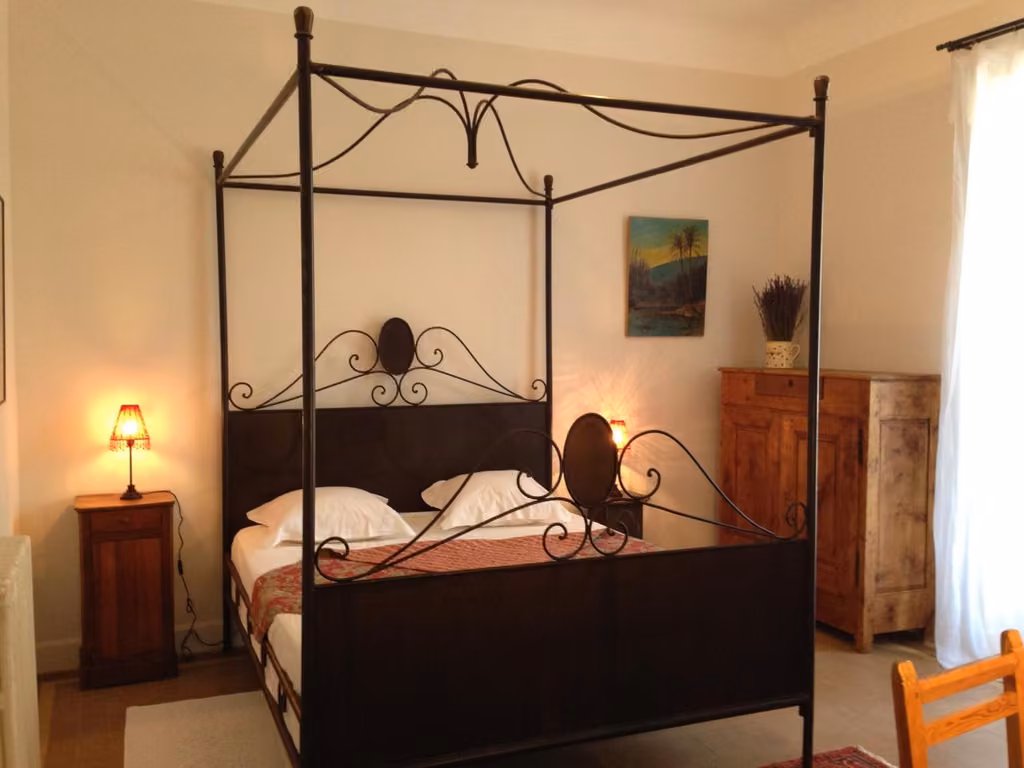 Una camera da letto di Villa Regina B&B